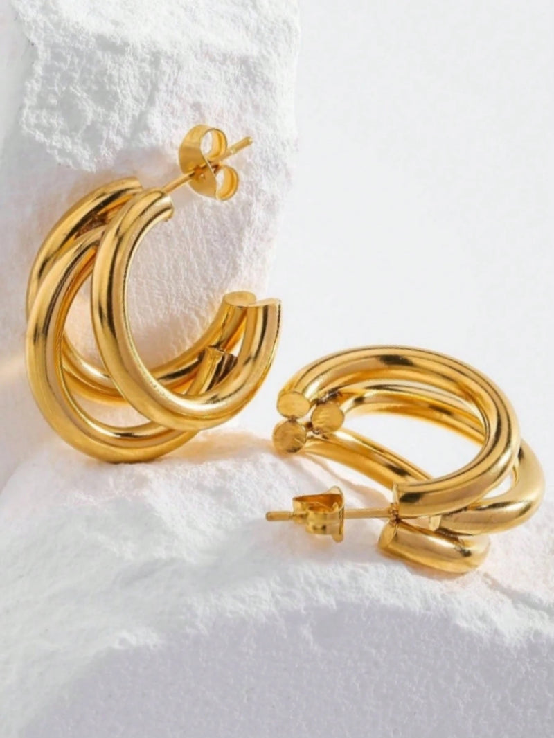 1 par de brincos de argola de aço inoxidável.