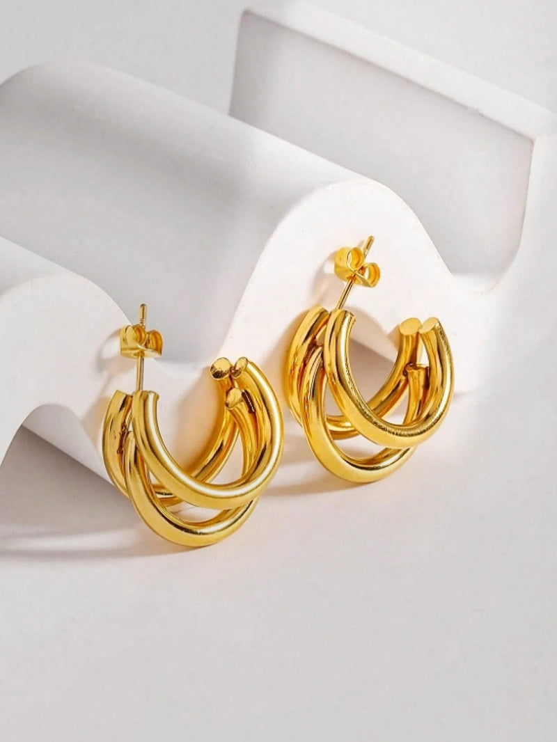 1 par de brincos de argola de aço inoxidável.