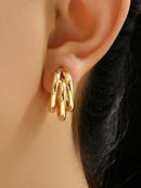 1 par de brincos de argola de aço inoxidável.