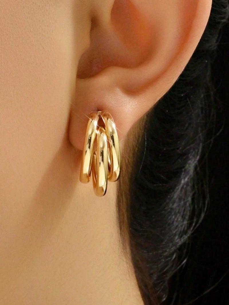 1 par de brincos de argola de aço inoxidável.