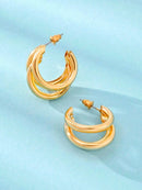 1 par de brincos de argola de aço inoxidável.