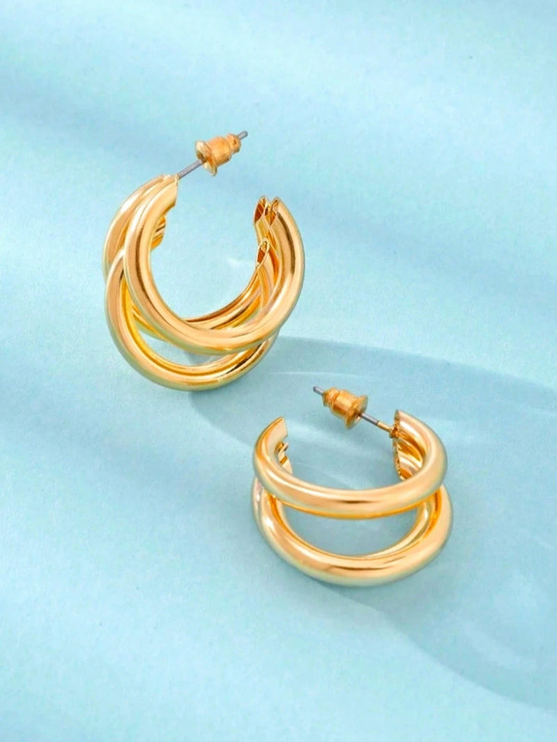 1 par de brincos de argola de aço inoxidável.