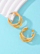 1 par de brincos de argola de aço inoxidável.