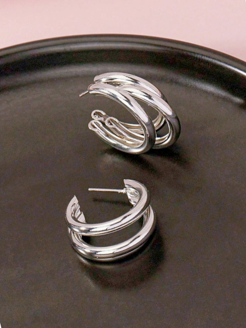 1 par de brincos de argola de aço inoxidável.